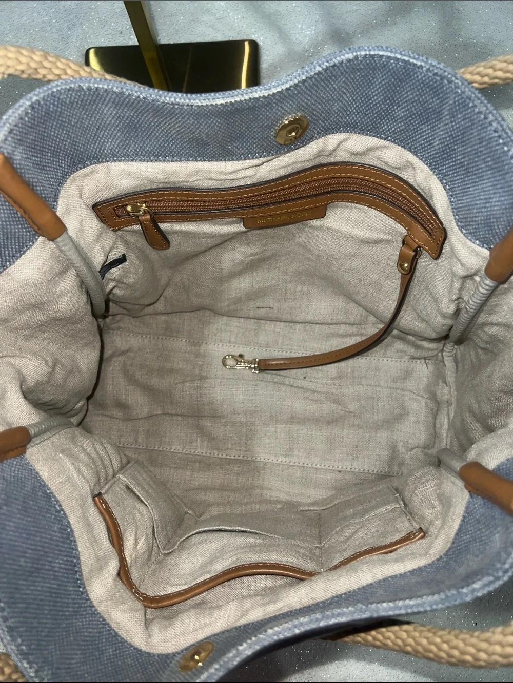 Michael Kors Isla Large Tote Bag, washed denim with signature rope handles.